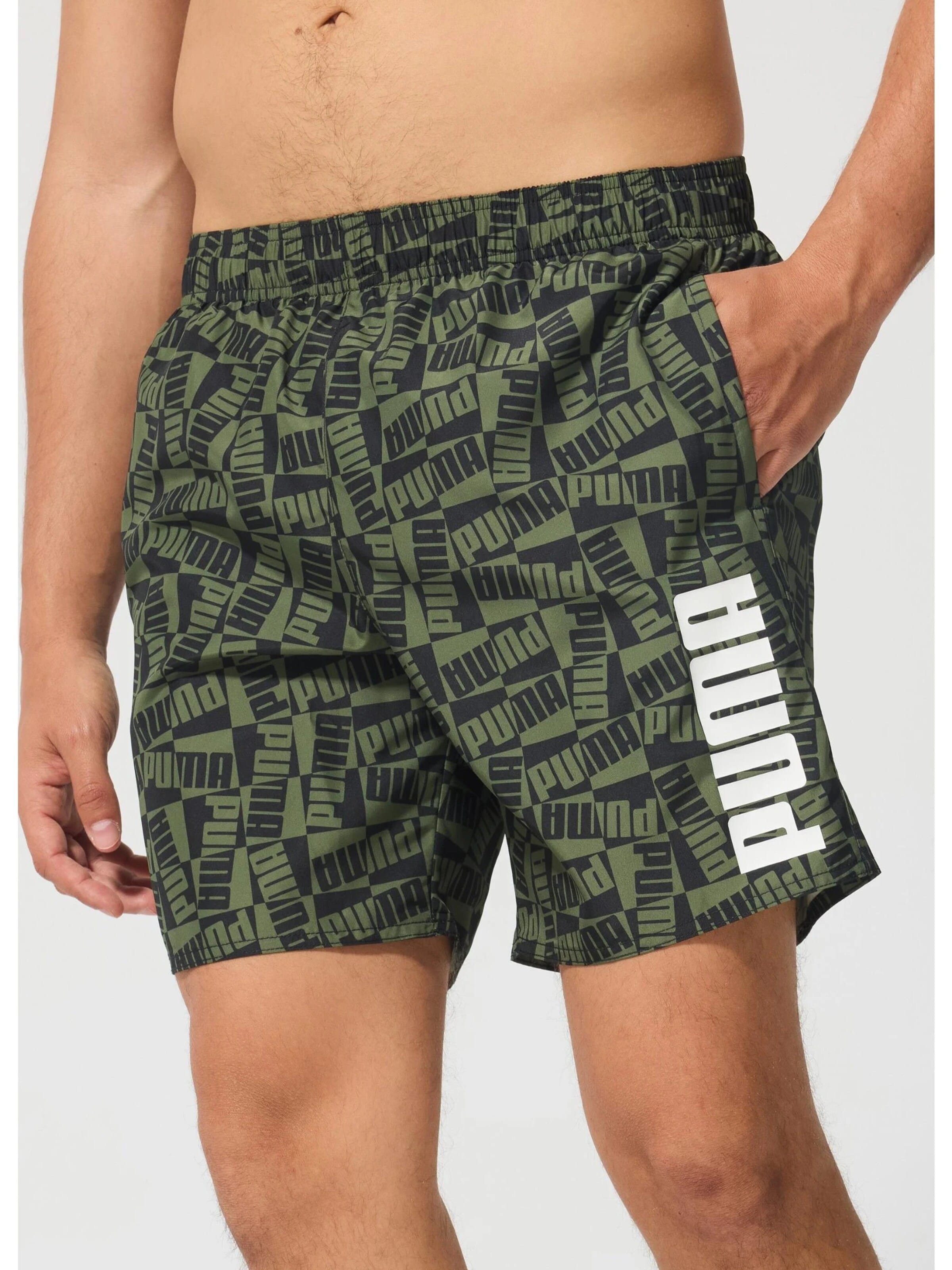 PUMA - Bermudas en verde