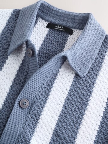 Next Pletena jopa | modra barva