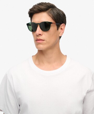 Lunettes de soleil Superdry en vert