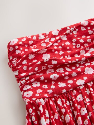 Next - Falda en rojo