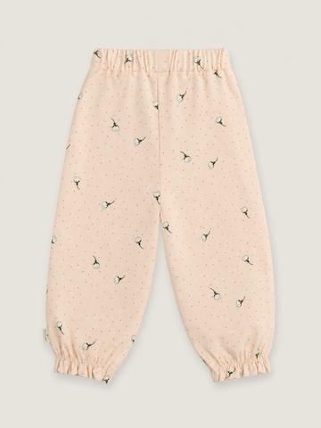 Pantalon 'Ellen White flowers rose' LouieLouie en rose : devant
