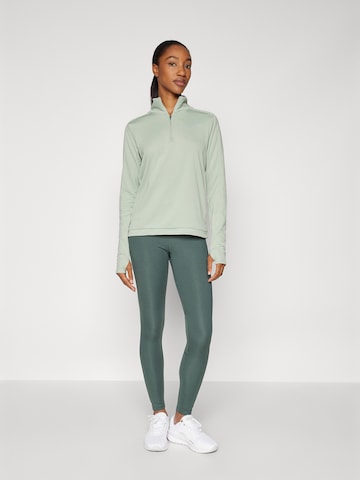 NIKE - Skinny Calças de desporto 'Epic Fast' em verde