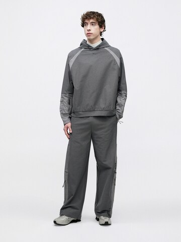 Nike Sportswear Szabványos Nadrág - szürke