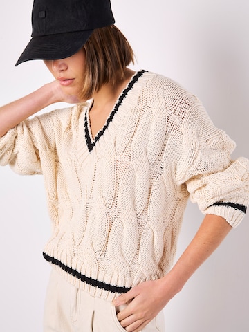 Pull-over ' ' Apricot en gris