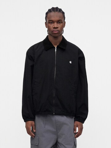 Carhartt WIP Φθινοπωρινό και ανοιξιάτικο μπουφάν 'Madison' σε μαύρο: μπροστά