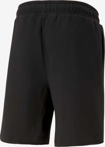 PUMA Regular Sports trousers 'Posterize' in Black