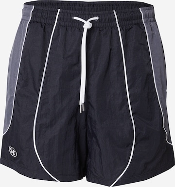 Pantalon de sport 'Icon Volley' UNDER ARMOUR en noir : devant