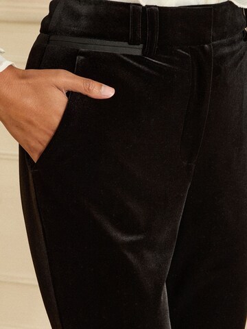 évasé Pantalon love & roses en noir