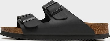 BIRKENSTOCK Sandals in Black: front