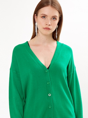 Influencer Плетена жилетка в зелено