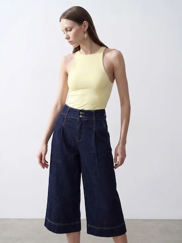 Dilvin - Blusa body em amarelo
