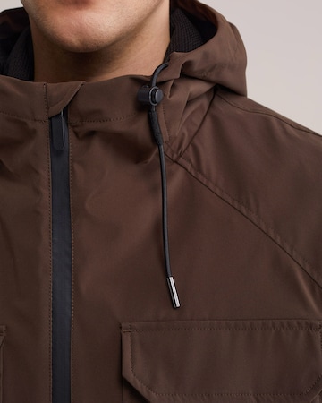 WE Fashion Välikausitakki värissä ruskea