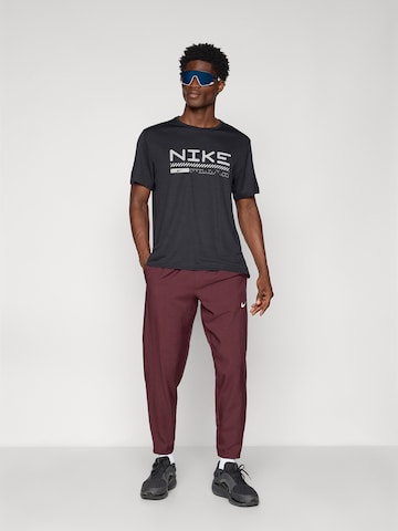 NIKE Funktsionaalne särk 'WINTER MILER', värv must
