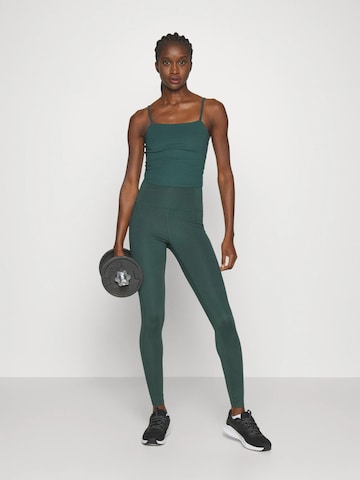 Girlfriend Collective Skinny Sportovní kalhoty ' Compressive ' – zelená