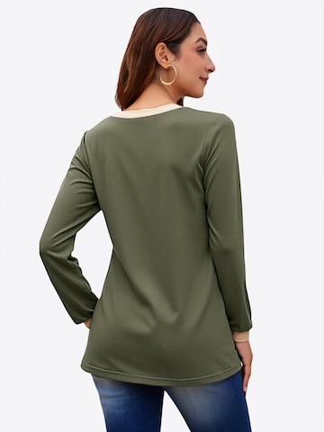 Tricou de la Imily Bela pe verde: spate