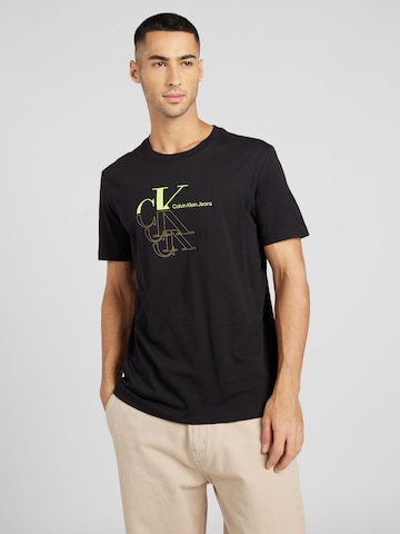 Regular T-Shirt Calvin Klein Jeans en noir : devant