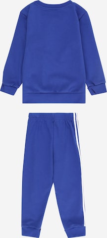 ADIDAS SPORTSWEARSkinny Odjeća za vježbanje 'Badge Of Sport French Terry' - plava boja