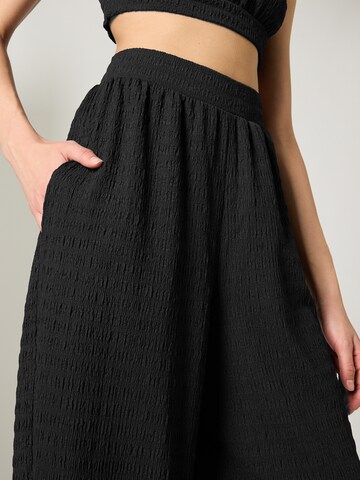 Guido Maria Kretschmer Women Wide leg Trousers 'TAMARA' in Black