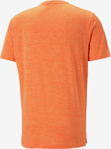 PUMA Sportshirt 'TRAIN FAV HEATHER CAT' in Orange