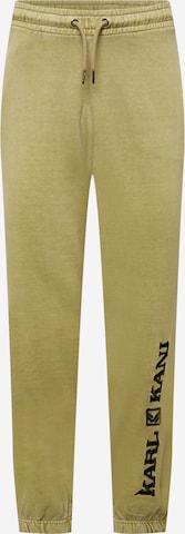 Karl Kani Tapered Pants in Green: front