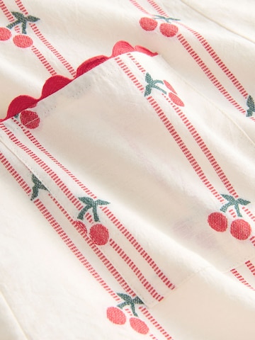 Next - Mono en beige