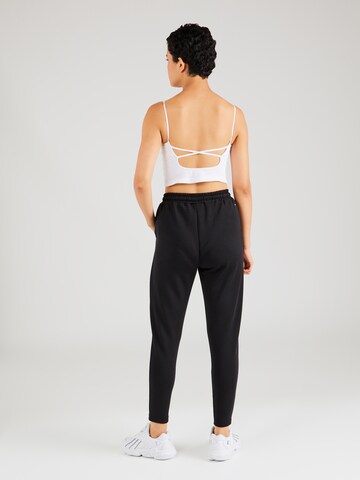 Tapered Pantaloni sportivi 'Jacey V2' di Athlecia in nero