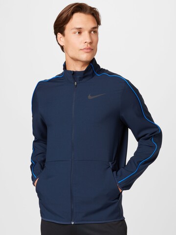 NIKE Athletic Zip-Up Hoodie in Blue: front