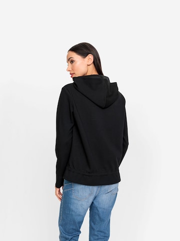 heine - Sweatshirt em preto