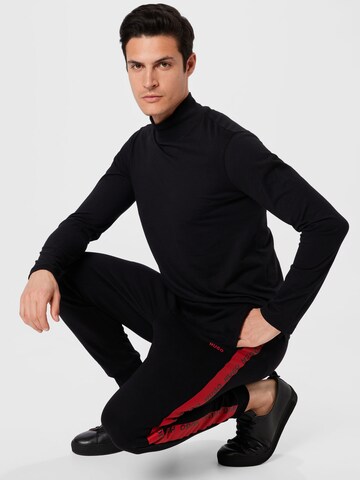 Tapered Pantaloni 'Darpaccio' di HUGO Red in nero