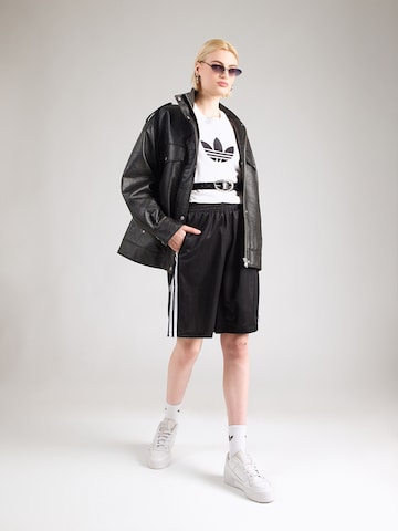 ADIDAS ORIGINALS - Acampanado Pantalón '3S' en negro