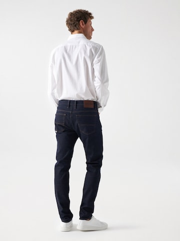 Coupe slim Jean Salsa Jeans en bleu