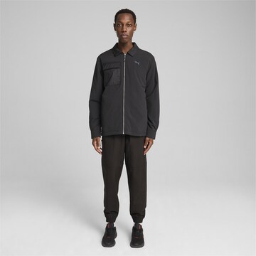 PUMA Sportjacke 'Transeasonal ' in Schwarz