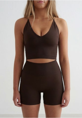 Skinny Pantaloni sportivi di Aim'n in marrone