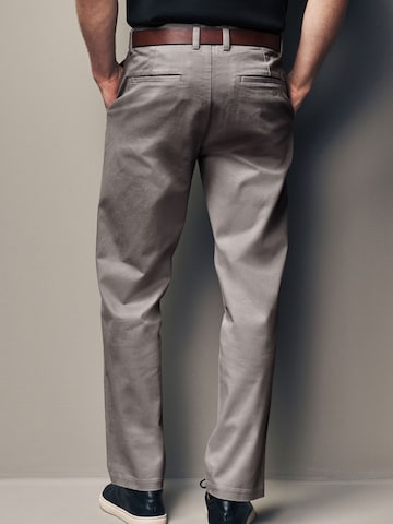 Slimfit Pantaloni chino di Next in grigio