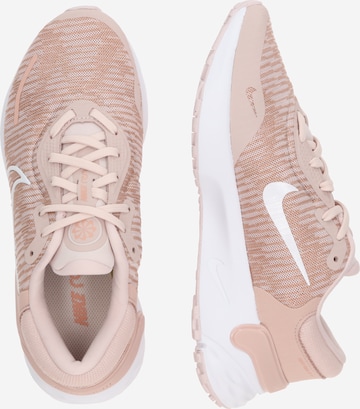 Chaussure de course NIKE en rose