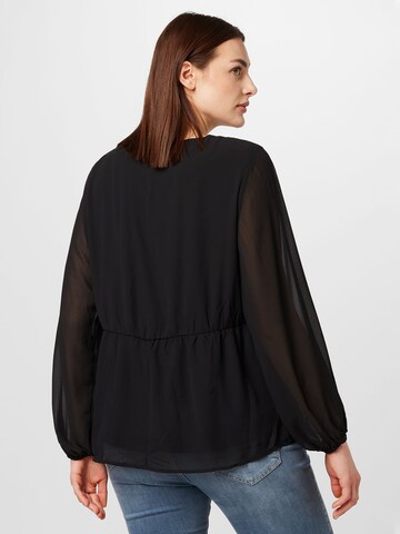 EVOKED Bluse in Schwarz