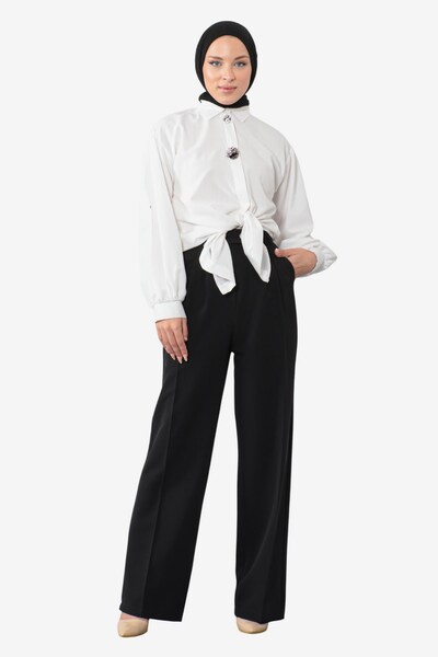 MODAMIHRAM Trousers with creases in Black, Item view