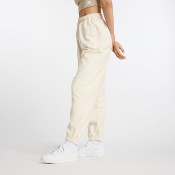 Baggy Pantalon new balance en beige