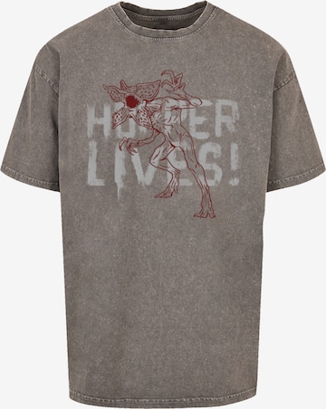 T-Shirt 'Stranger Things Hoppers Live Netflix TV Series' F4NT4STIC en gris : devant