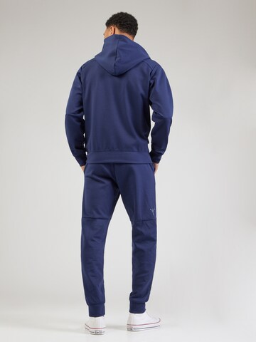 Costum de trening de la Champion Authentic Athletic Apparel pe albastru