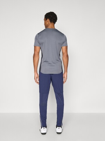 UNDER ARMOUR Slimfit Sporthose 'Challenger' in Blau