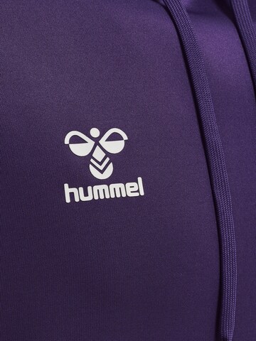 Hummel Urheilullinen collegepaita värissä lila