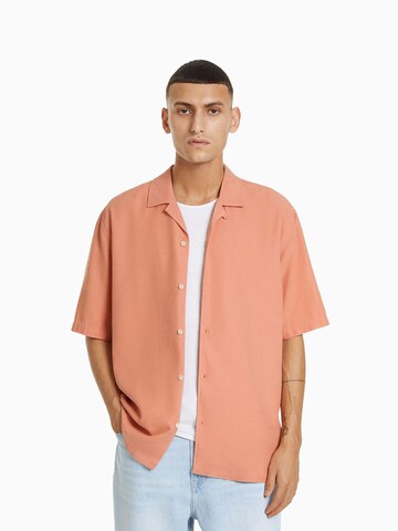 Bershka Comfort fit Button Up Shirt in Orange: front