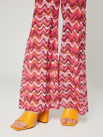 Hoermanseder x About You Flared Trousers 'Lynn' in Pink