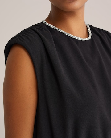 WE Fashion - Macacões em preto