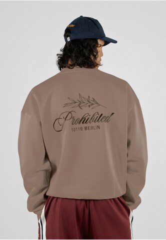 Sweat-shirt Prohibited en beige : devant