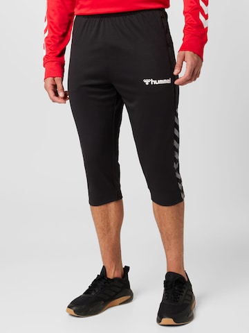 Coupe slim Pantalon de sport Hummel en noir : devant