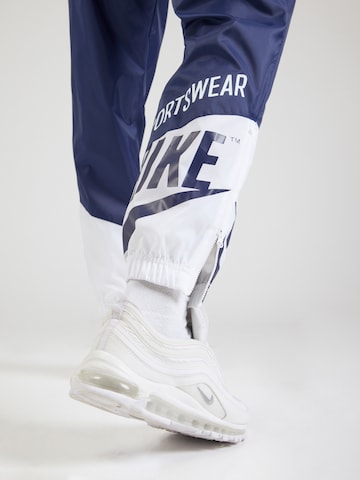 Nike Sportswear Tapered Trousers in Blue