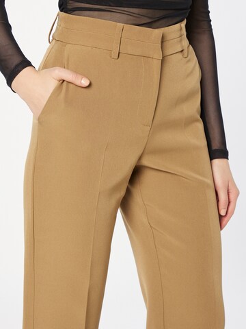 Flared Pantaloni con piega frontale 'BLURIS' di Y.A.S in marrone