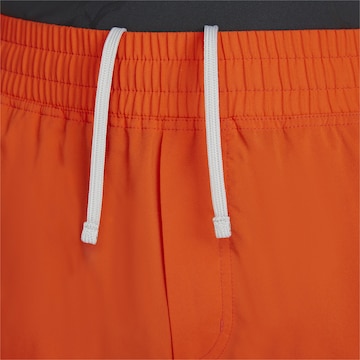PUMA Normální Sportovní kalhoty – oranžová